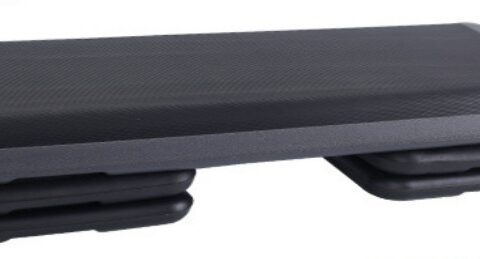 A sleek, 110cm long leather step board in grey, featuring a non-slip textured surface for enhanced grip. The board has a sturdy frame and is designed for versatile fitness routines such as step aerobics and strength training